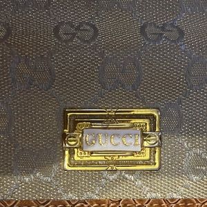 Gucci trifold wallet